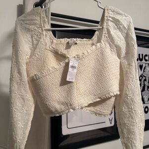 American Eagle Outfitters Cream Smocked Long-Sleeve Crop Top